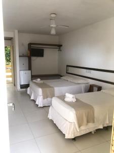 Postel nebo postele na pokoji v ubytování Mar & Sol Praia Hotel
