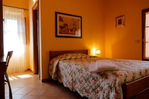 Agriturismo Villa Guarnaschelli客房内的一张或多张床位