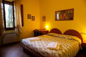 Agriturismo Villa Guarnaschelli客房内的一张或多张床位
