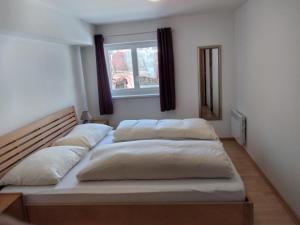 Posteľ alebo postele v izbe v ubytovaní Pfefferhütte