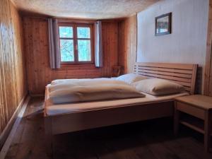 Posteľ alebo postele v izbe v ubytovaní Pfefferhütte