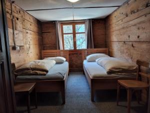 Posteľ alebo postele v izbe v ubytovaní Pfefferhütte