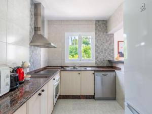 A kitchen or kitchenette at Holiday Home Anromi by Interhome