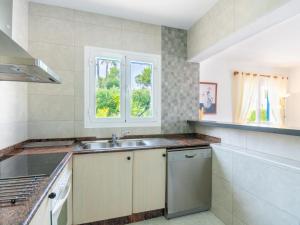A kitchen or kitchenette at Holiday Home Anromi by Interhome
