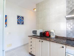 A kitchen or kitchenette at Holiday Home Anromi by Interhome