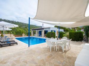 The swimming pool at or close to Holiday Home Anromi by Interhome
