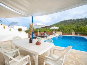 The swimming pool at or close to Holiday Home Anromi by Interhome
