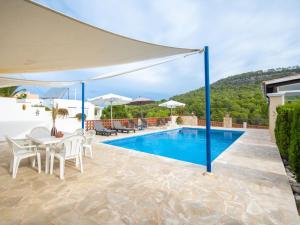 The swimming pool at or close to Holiday Home Anromi by Interhome
