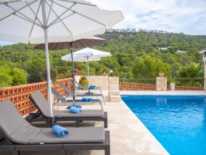 The swimming pool at or close to Holiday Home Anromi by Interhome