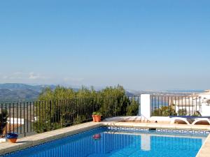 a swimming pool with a view of the mountains at Holiday Home Casa Esperanza by Interhome in Monte Pego