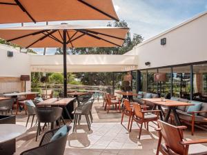Um restaurante ou outro lugar para comer em Hotel Don Pepe Gran Meliá