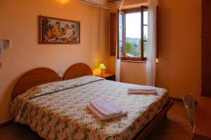 Agriturismo Villa Guarnaschelli客房内的一张或多张床位