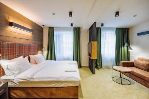Postel nebo postele na pokoji v ubytování Iglika Hotel & Villas Borovets