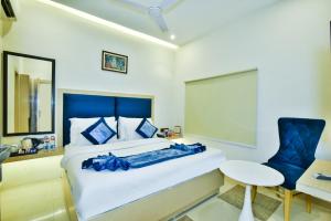 Cama o camas de una habitación en Hotel Puri Palace