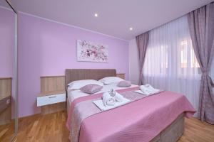 Posteľ alebo postele v izbe v ubytovaní M&M Holiday House with a Pool