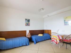 Cama ou camas em um quarto em Apartment Riva Bella-1 by Interhome