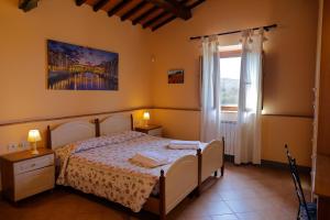 Postel nebo postele na pokoji v ubytování Agriturismo Villa Guarnaschelli + 37 fotografií