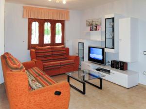 Μια τηλεόραση ή/και κέντρο ψυχαγωγίας στο Holiday Home Memphis by Interhome