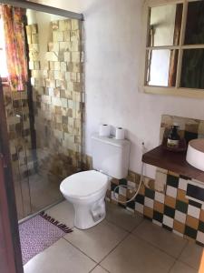Kylpyhuone majoituspaikassa Pousada Villa Cachoeira