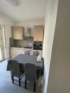 A kitchen or kitchenette at La Terrazza Apartment