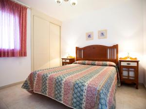 Ένα ή περισσότερα κρεβάτια σε δωμάτιο στο Apartment Amatista-6 by Interhome