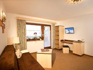 A television and/or entertainment centre at Apartment Alpin-1 by Interhome Még 29 kép