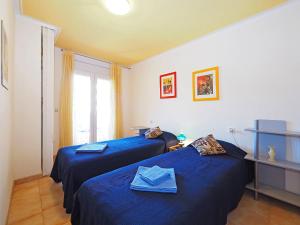 Postel nebo postele na pokoji v ubytování Apartment Gran Reserva-23 by Interhome