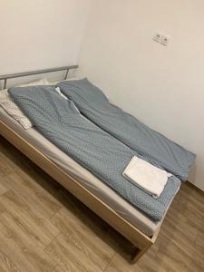 Postel nebo postele na pokoji v ubytování Beregi Apartman