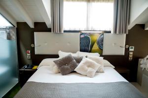 Voodi või voodid majutusasutuse Costa Esmeralda Suites toas