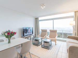 TV a/nebo společenská místnost v ubytování Apartment Seaview 2 by Interhome