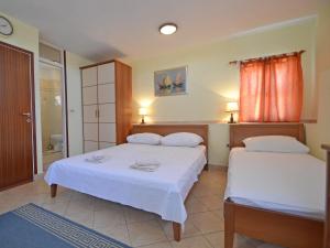 Postel nebo postele na pokoji v ubytování Holiday Home Kala by Interhome