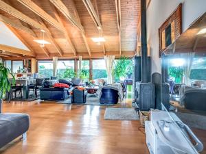 a living room with couches and a fireplace at Holiday Home Blue Moustoir by Interhome in Carnac +34 photos