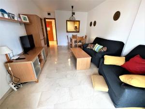 A television and/or entertainment centre at A551 - Atrium Beach 3 - 2004 Finestrat s.l.