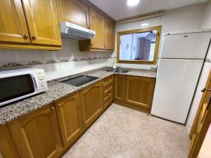 A kitchen or kitchenette at A551 - Atrium Beach 3 - 2004 Finestrat s.l.