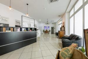 Posezení v ubytování GuestHouse Lugano Apartments by LR