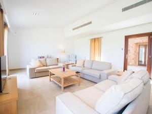 a living room with two couches and a coffee table at Holiday Home Can Toni by Interhome in Inca +39 photos