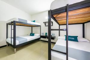 Bunk bed o mga bunk bed sa kuwarto sa Ayenda Mirador del Café