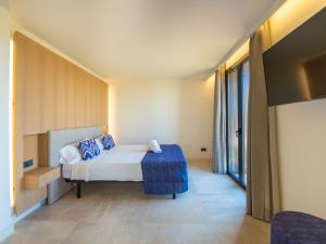 Ein Bett oder Betten in einem Zimmer der Unterkunft Villa Can Navarro by Interhome