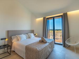 Ein Bett oder Betten in einem Zimmer der Unterkunft Villa Can Navarro by Interhome