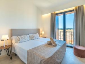 Ein Bett oder Betten in einem Zimmer der Unterkunft Villa Can Navarro by Interhome