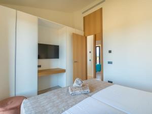 Ein Bett oder Betten in einem Zimmer der Unterkunft Villa Can Navarro by Interhome