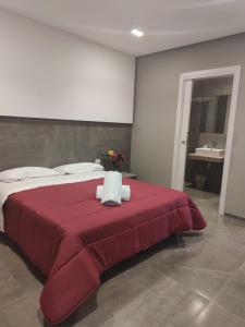 A bed or beds in a room at Hotel Valle Verde