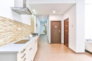 Kuchyňa alebo kuchynka v ubytovaní Laramond Barcelona Rooms
