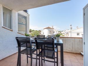 A balcony or terrace at Apartment Sant Maurici-25 by Interhome