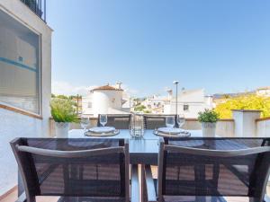 A balcony or terrace at Apartment Sant Maurici-25 by Interhome