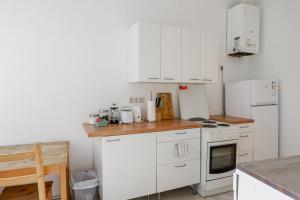 Kuchyň nebo kuchyňský kout v ubytování Vienna City Apartments Unteres Belvedere