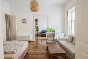 Postel nebo postele na pokoji v ubytování Vienna City Apartments Unteres Belvedere