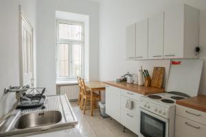 Kuchyň nebo kuchyňský kout v ubytování Vienna City Apartments Unteres Belvedere