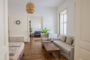 Postel nebo postele na pokoji v ubytování Vienna City Apartments Unteres Belvedere