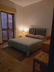 Een bed of bedden in een kamer bij Casa Nancy